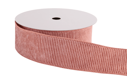 Pink ribbed velvet wired ribbon wound on a white spool, 2.5 inches wide
