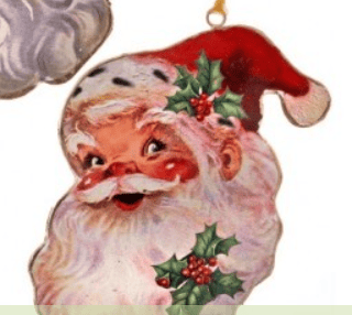 Vintage-style metal Santa face ornament with red hat and holly decoration