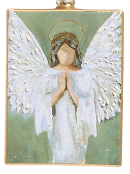 Painted angel ornament with white wings, halo, praying hands on green background