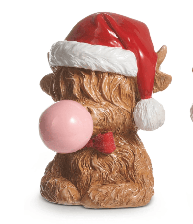 Ceramic highland cow figurine wearing Santa hat blowing pink bubblegum bubble