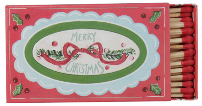 Red Christmas matchbox with holly, ribbon design, and red-tipped safety matches
