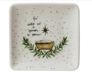 White stoneware dish with nativity manger, greenery, star, and holiday scripture text