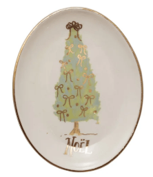 Oval white stoneware dish with green Christmas tree, gold bows, and Noël text