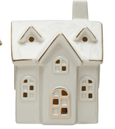 White stoneware house figurine with gold accents, snow-dusted roof, LED light inside