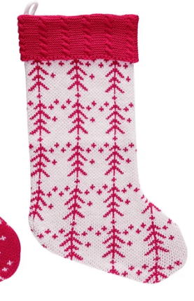 White knit Christmas stocking with pink tree pattern and red cable-knit cuff