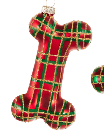 Red and green plaid glass dog bone Christmas ornament with gold glitter accents