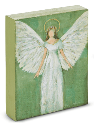 Painted wood block art featuring a white-robed angel with wings on green background