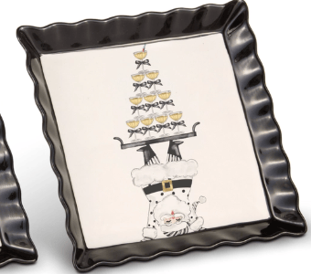 Black square ceramic tray with upside-down Santa balancing champagne tower illustration
