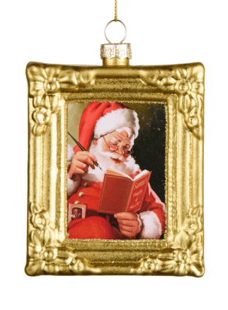 Gold framed glass ornament featuring vintage Santa Claus reading a book illustration