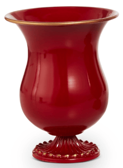 Glossy red ceramic urn vase with gold rim and decorative pedestal base