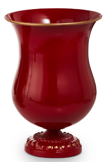 Glossy red ceramic urn vase with gold rim and decorative footed base