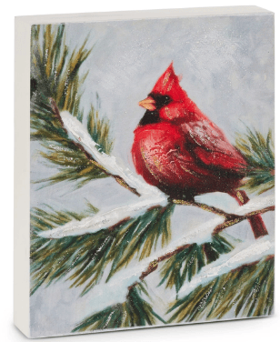 Painted canvas block art of red cardinal perched on snow-covered pine branch