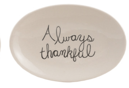 Oval white stoneware plate with black cursive text reading Always Thankful