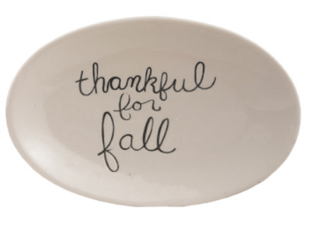 Oval white stoneware plate with black handwritten text thankful for fall
