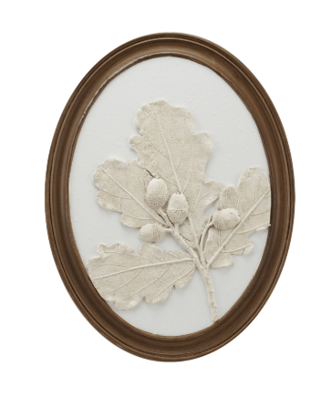 Oval wood framed wall decor with white plaster cast oak leaves and acorns