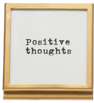 Gold square frame with easel displaying Positive Thoughts text on white background