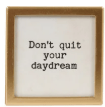Gold-framed glass magnet with black text reading Don't quit your daydream