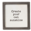 Small black metal framed glass magnet with 'Create your own sunshine' quote