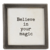 Small gray metal framed glass magnet with black text Believe in your magic