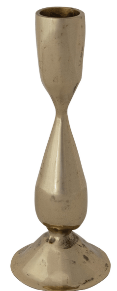 Hand-forged brass finish metal taper candle holder with hourglass silhouette and wide base