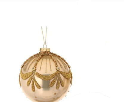Gold glass ball ornament with beaded Art Deco swag design and jewel accents