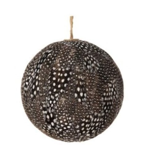 Round feather ball ornament with black and white spotted guinea fowl pattern, jute string hanger