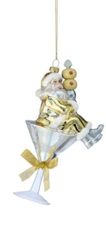 Gold and silver Santa Claus sitting in martini glass Christmas ornament with olive pick