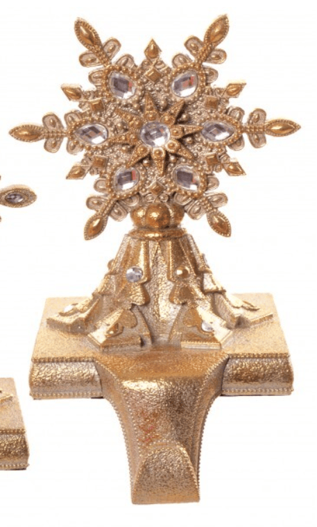 Gold resin stocking holder with jeweled snowflake top and ornate base
