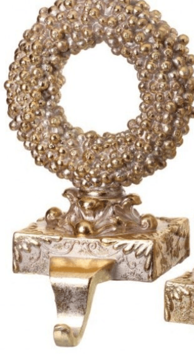 Gold and silver resin wreath stocking holder with ornate scrollwork base and hook