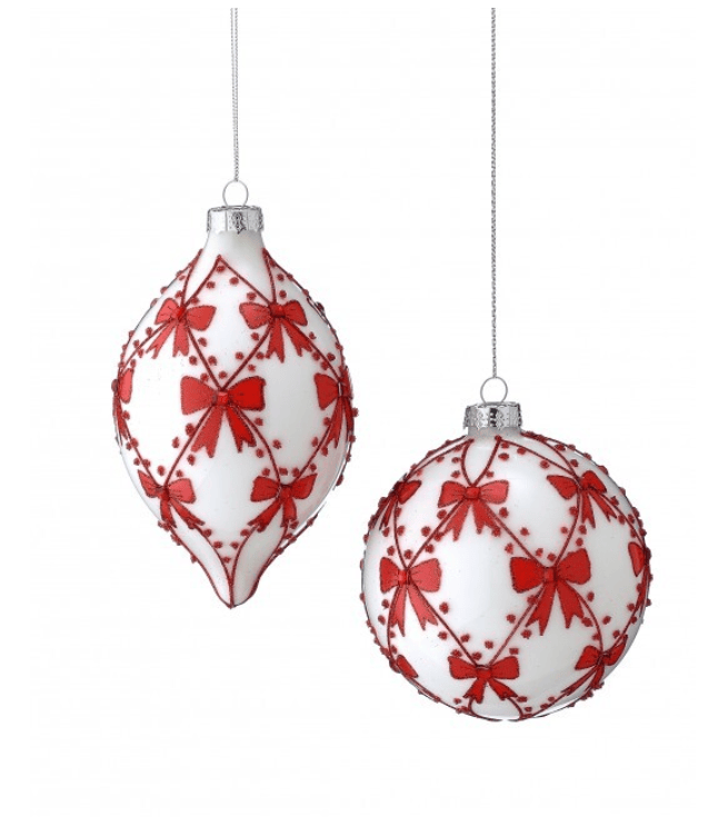 White glass ball and finial ornaments with red bow and jewel lattice pattern