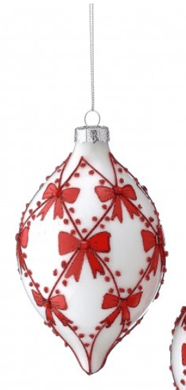 White glass finial ornament with red bow and jeweled diamond pattern