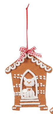 Gingerbread doghouse ornament with white icing, red bow, and white dog figurine inside
