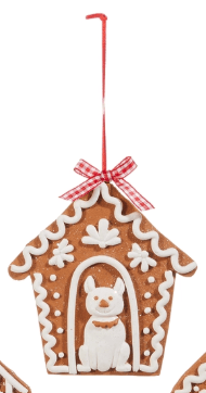 Gingerbread doghouse ornament with white icing, dog figure, and red plaid bow