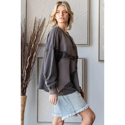 Washed charcoal patchwork waffle-knit pullover top with frayed seams and balloon sleeves