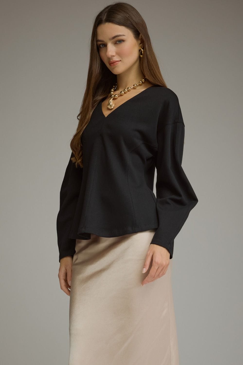 Entro black curved seam long sleeve V-neck blouse with balloon sleeves