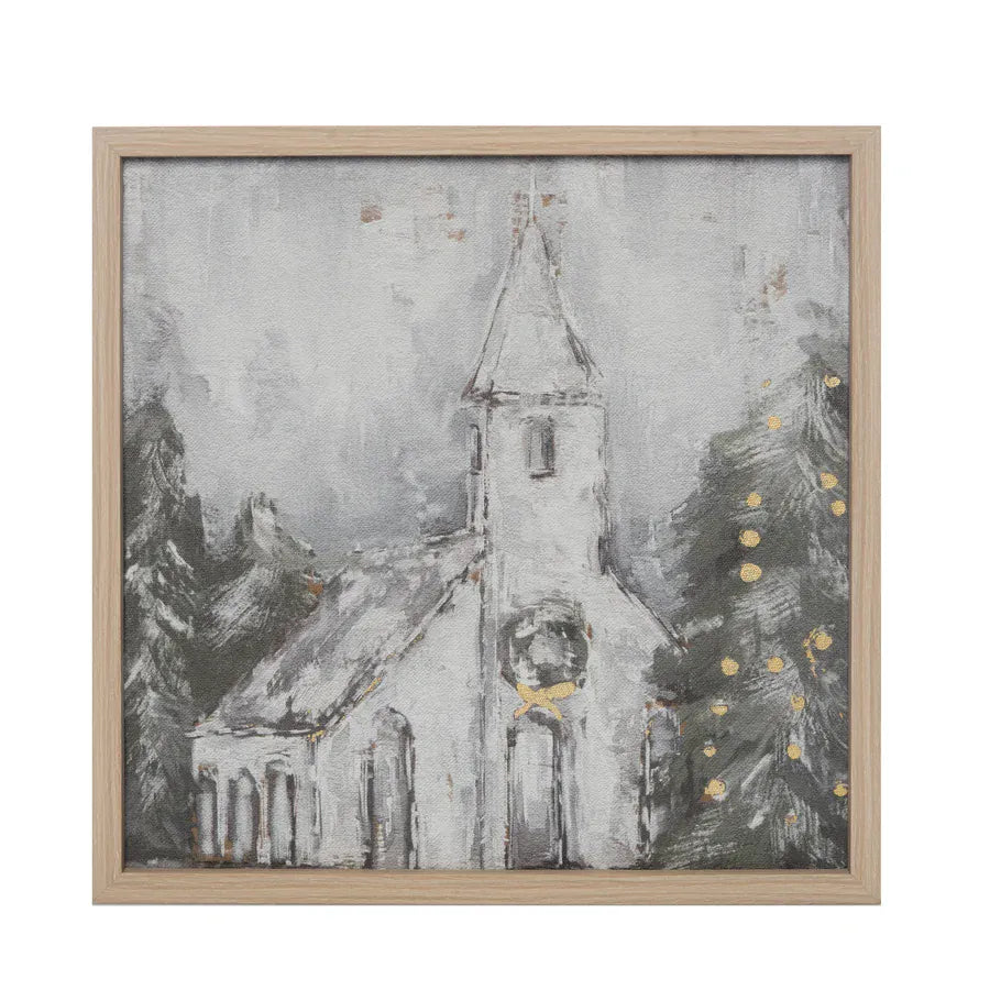 Framed canvas wall art depicting a white church with Christmas wreath and gold-lit tree