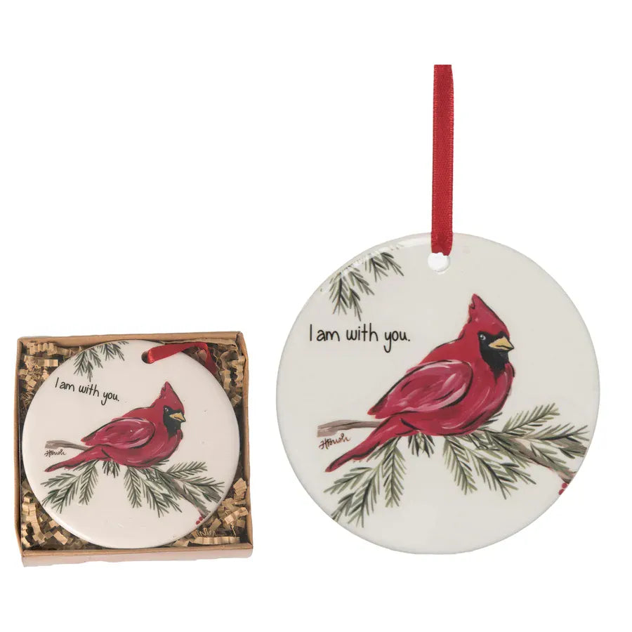 Round ceramic cardinal ornament with red ribbon and gift box, reading I am with you