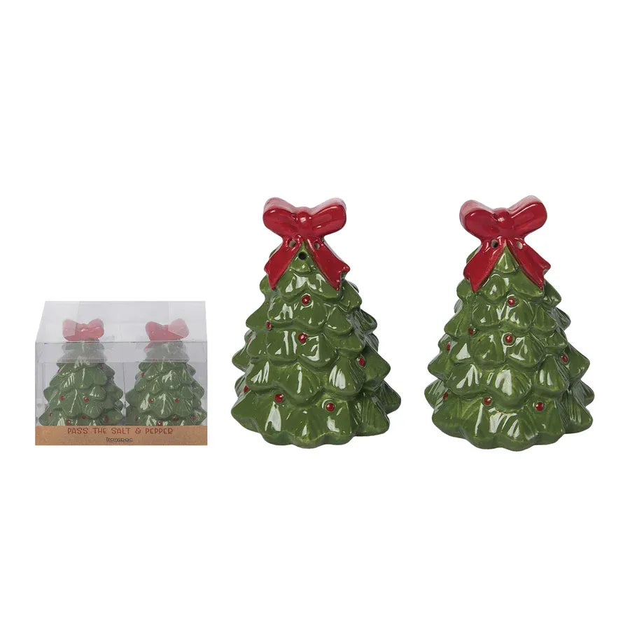 Green ceramic Christmas tree salt and pepper shakers with red bow toppers and berry details