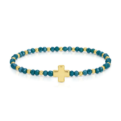 Teal crystal and gold bead stretch bracelet with gold cross charm centerpiece