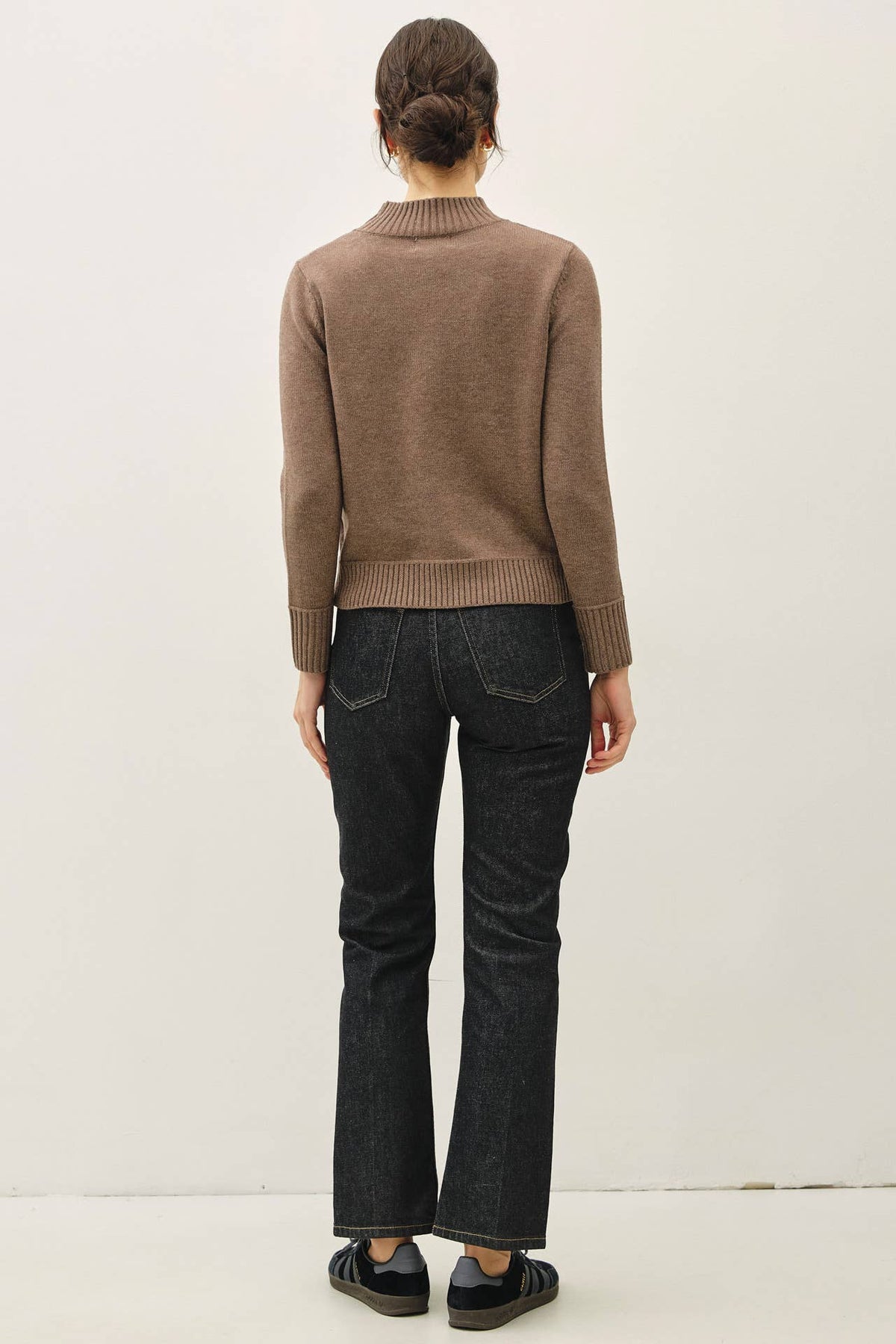 Ultra soft taupe mockneck sweater with ribbed cuffs and hem, back view
