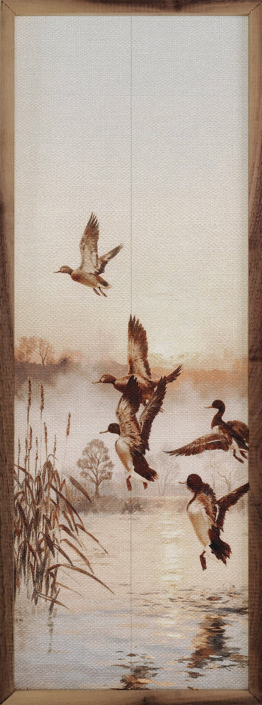 Framed walnut wood print of mallard ducks landing on misty lake with reeds