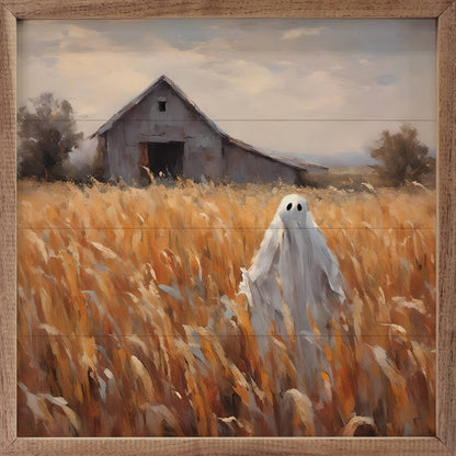 Framed oil painting of ghost figure in golden wheat field with rustic barn
