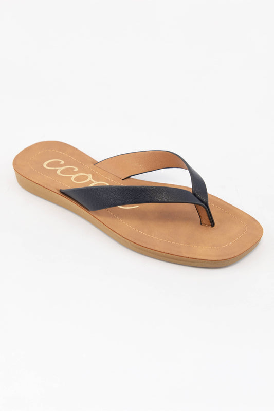 Black thong flip flop sandal with tan faux leather footbed and CCOCCI branding