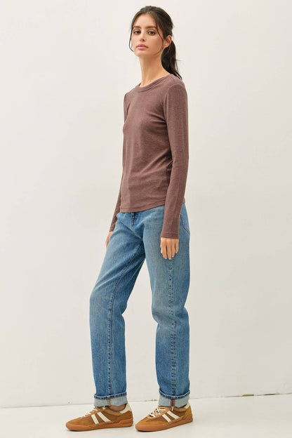 Be Cool round neck long sleeve fitted brown knit top paired with blue jeans