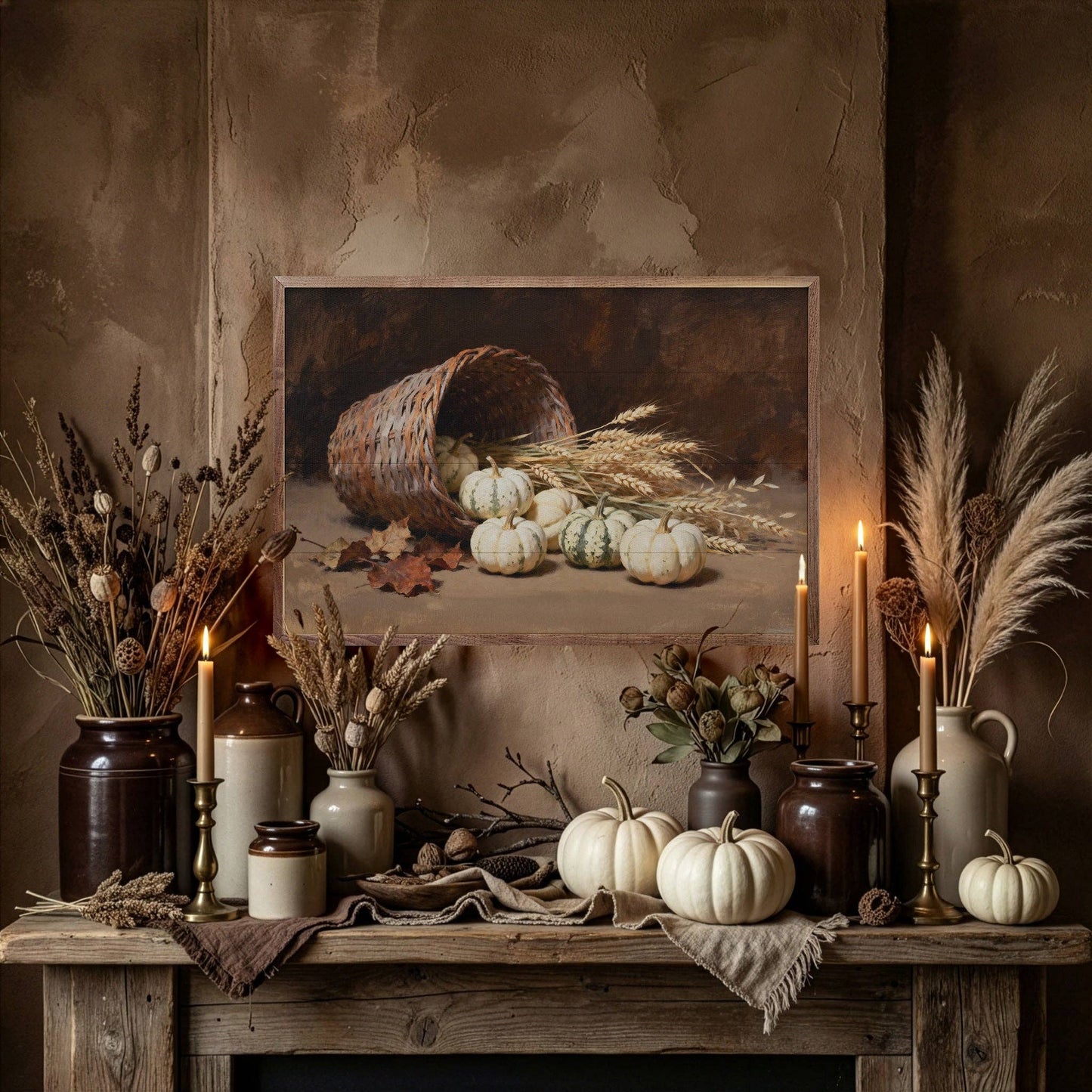 Framed fall painting of spilled pumpkin basket above rustic mantel with candles