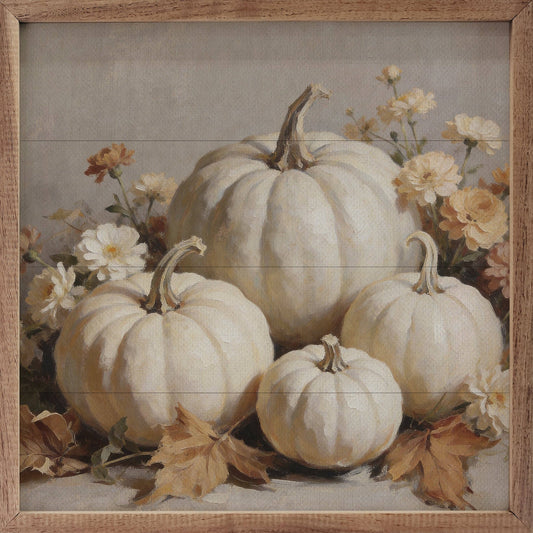 Framed wall art painting of white pumpkins with autumn flowers and dried leaves