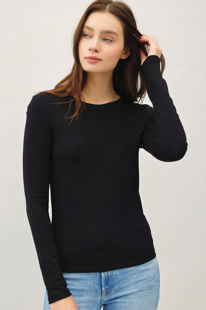 Be Cool black round neck long sleeve fitted knit top with blue jeans