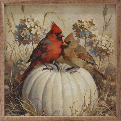 Cardinals On A Pumpkin