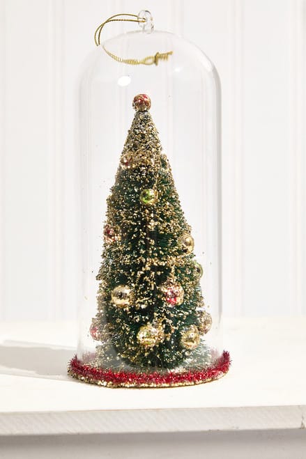 Miniature decorated Christmas tree inside a clear glass dome ornament with gold hanger