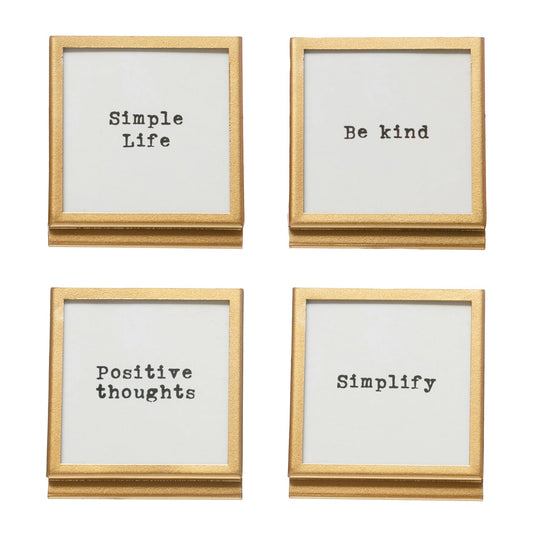 Set of four gold metal easel frames with motivational sayings on white inserts